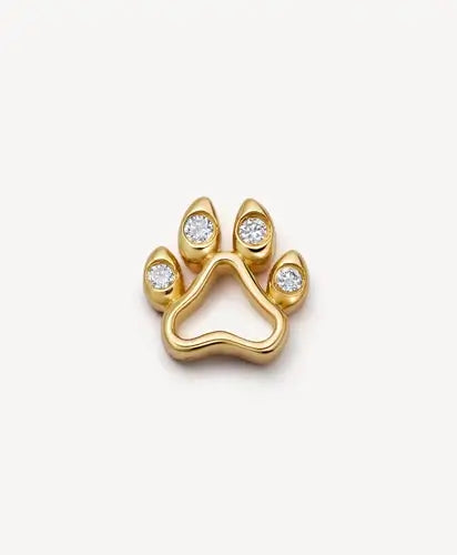 yellow gold paw charm set with diamonds.