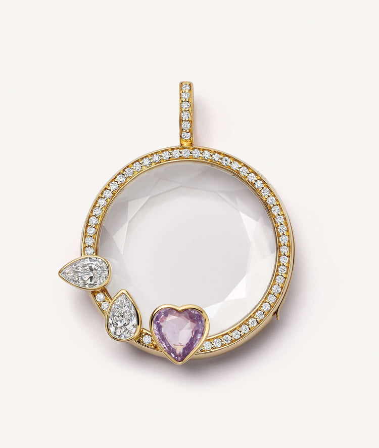 Aphrodite sapphire heart locket with diamond bell.