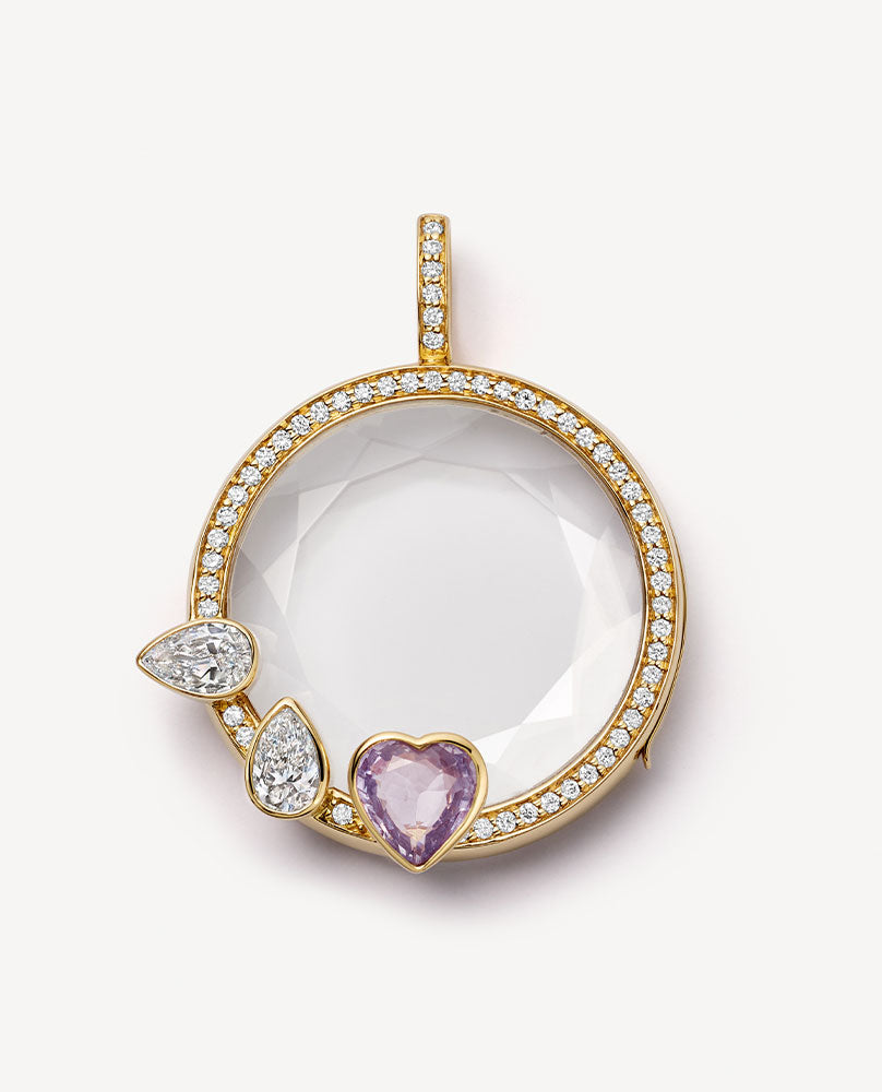 Aphrodite sapphire heart locket with diamond bell.