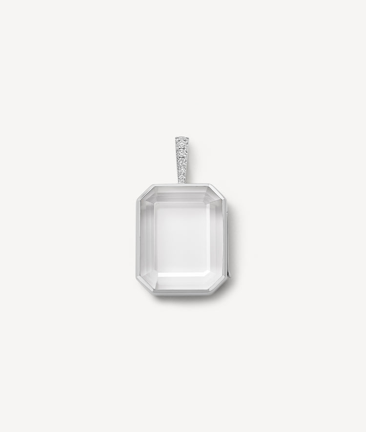 white gold baguette locket pendant with diamond bail and clear crystal on a white background
