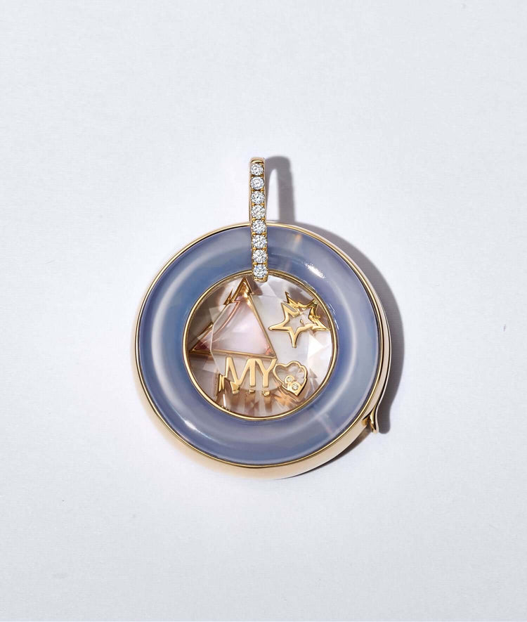 BLUE CHALCEDONY DIAMOND ROUND LOCKET with charms and a diamond bail.