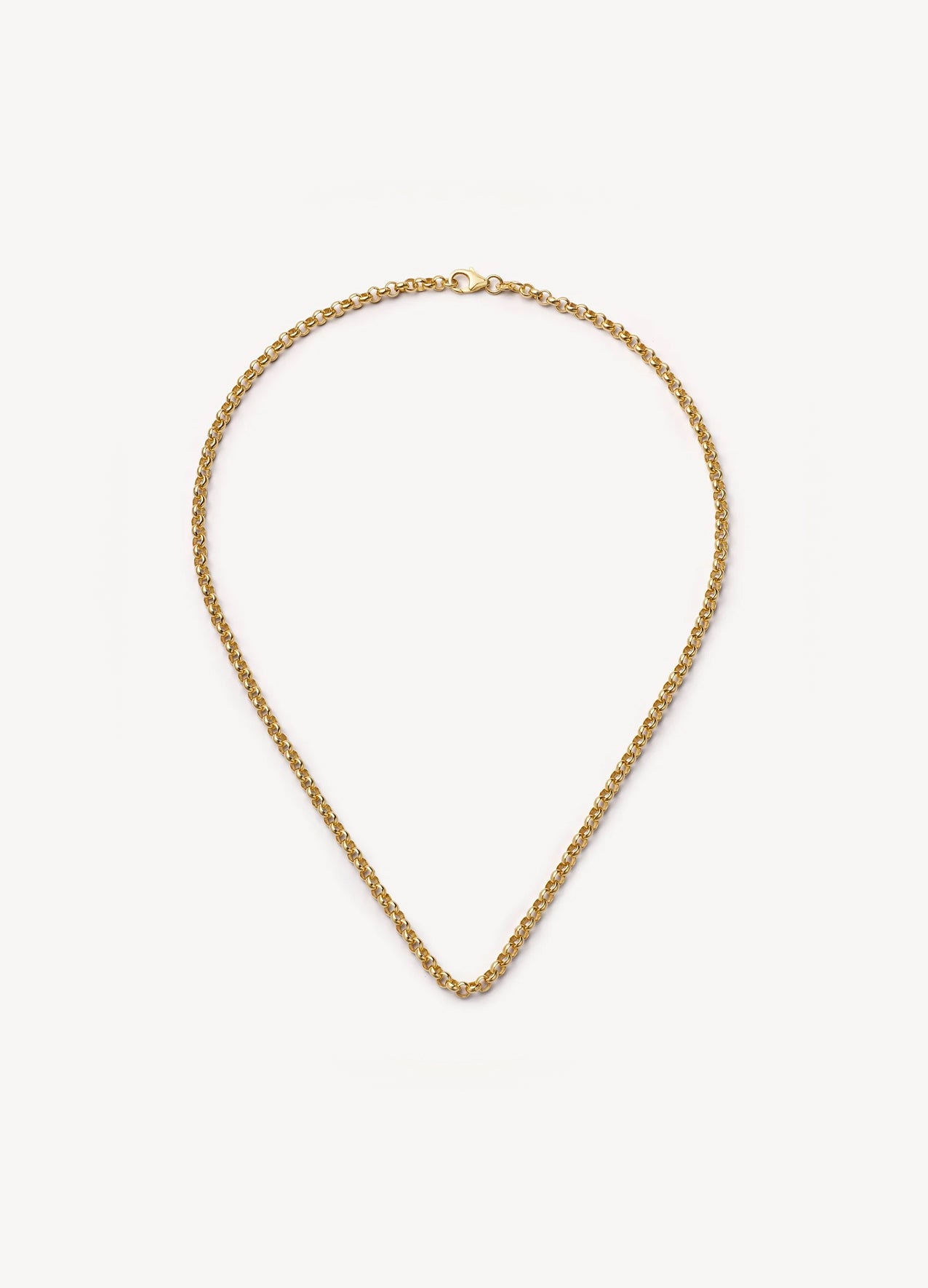 A delicate gold chain necklace with a small lobster clasp, displayed in a teardrop shape against a clean, off-white background.