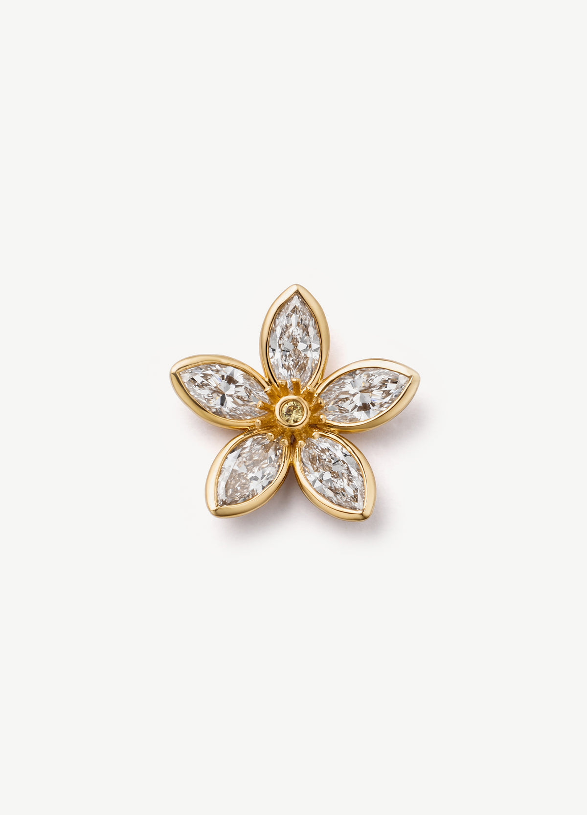 A gold flower-shaped charm with six marquise-cut diamond, photographed on a clean, light off-white background.