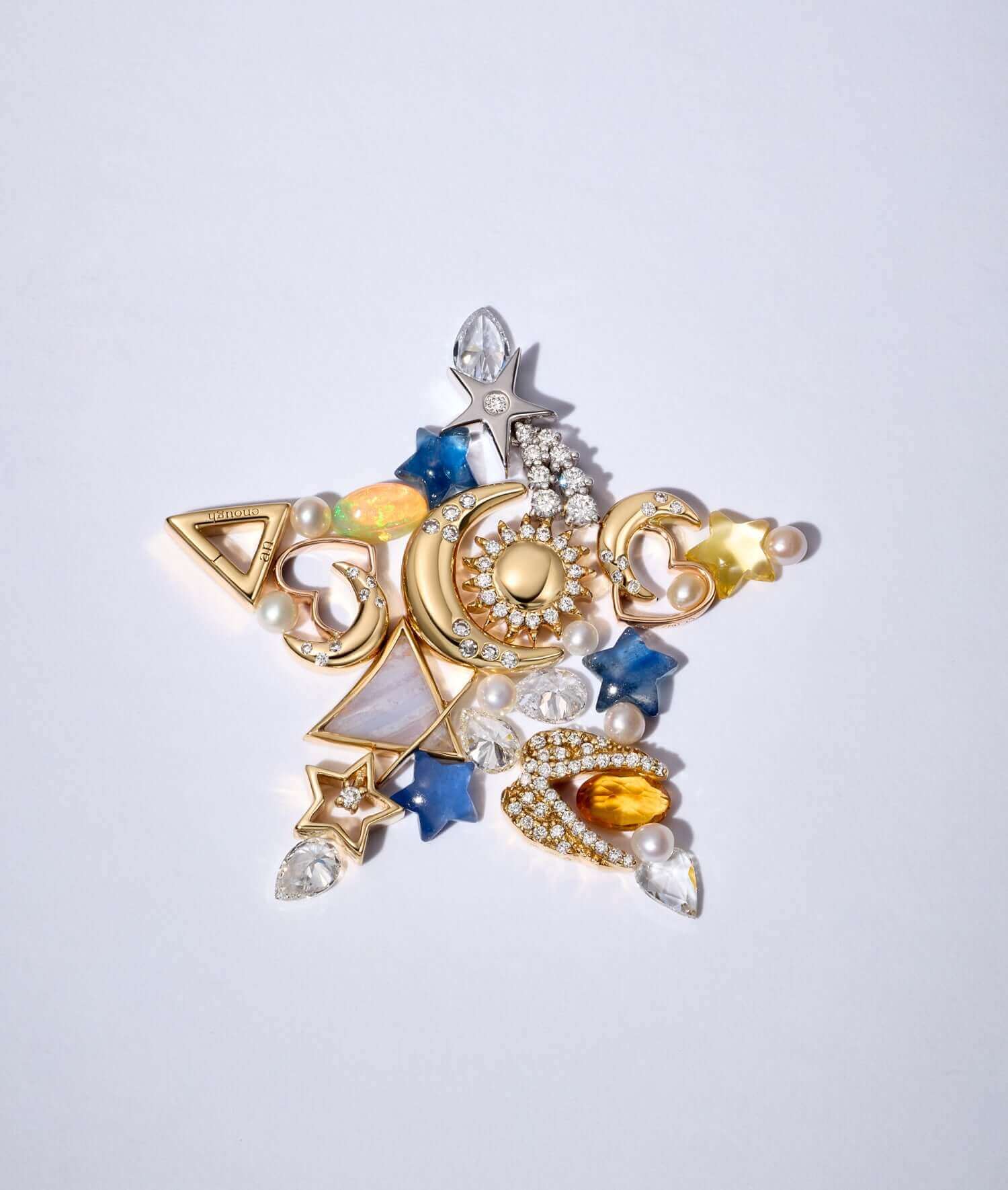 Celestial star charms styled in the shape of a star. 