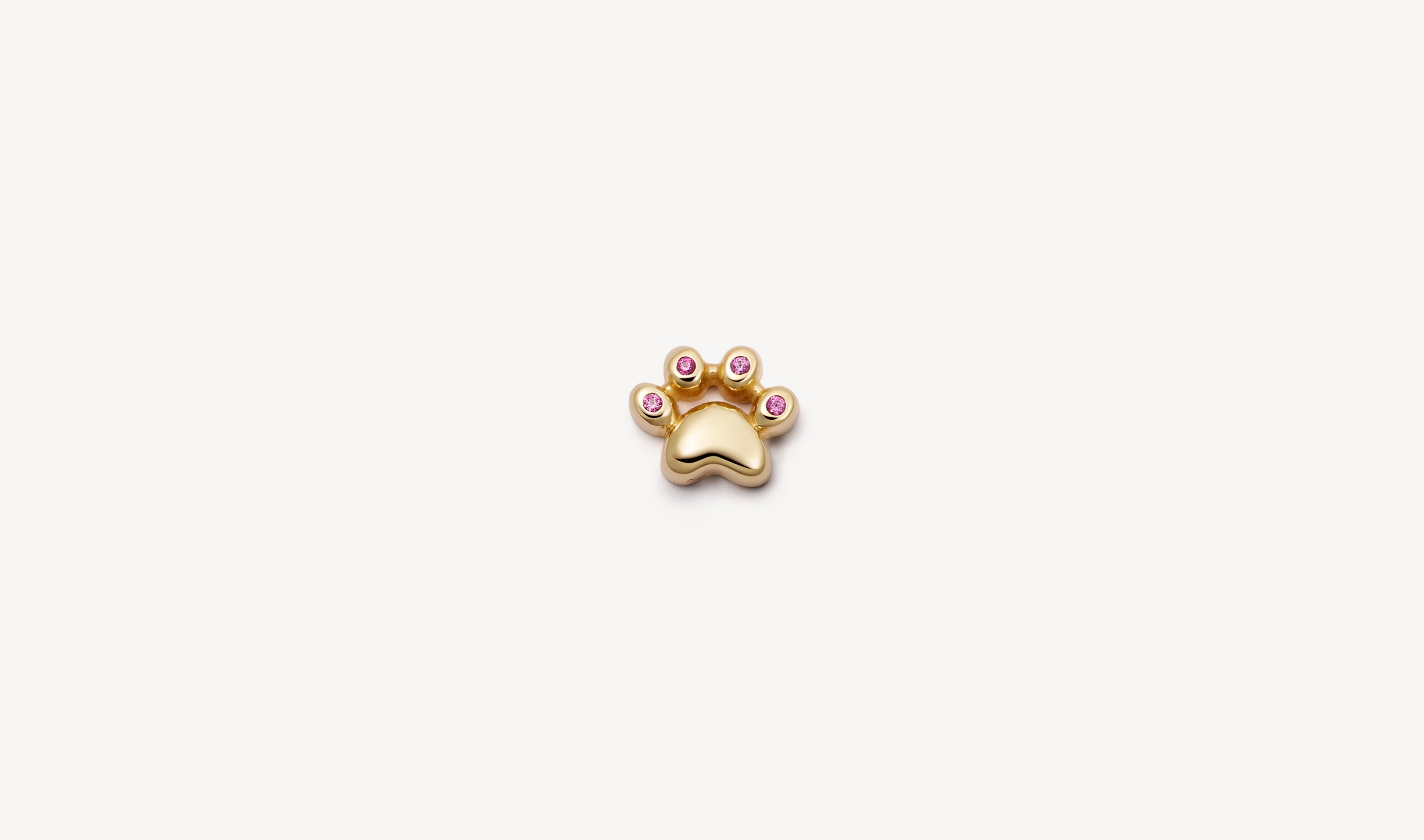 Cat paw charm yellow gold charm set with pink sapphire stones