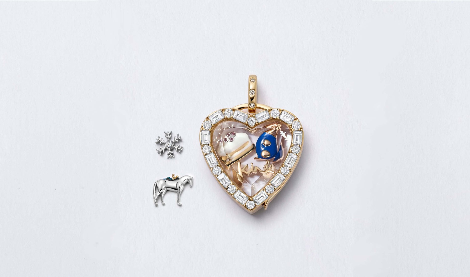 Amour diamond heart gold locket with 28k gold mixed Charlie Mackesy charms.