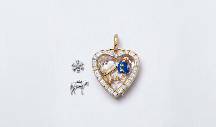 Amour diamond heart gold locket with 28k gold mixed Charlie Mackesy charms.