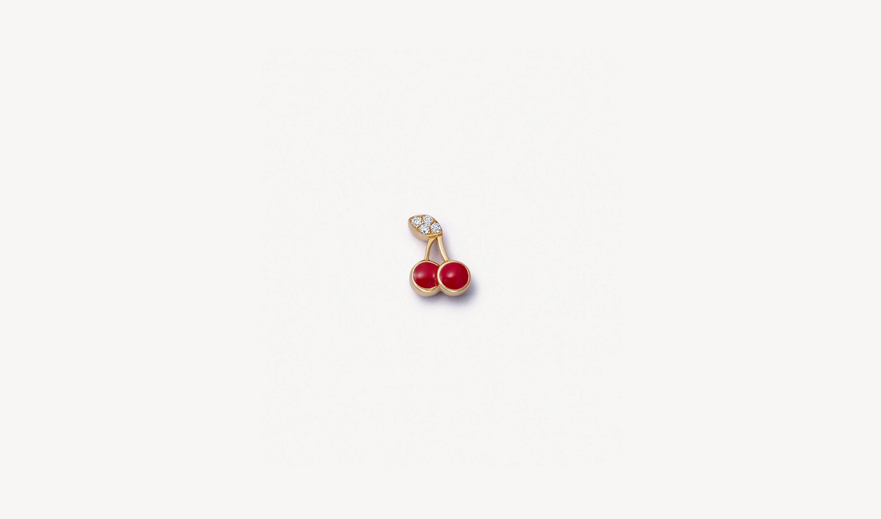 Red cherries in yellow gold with diamond leaf charm