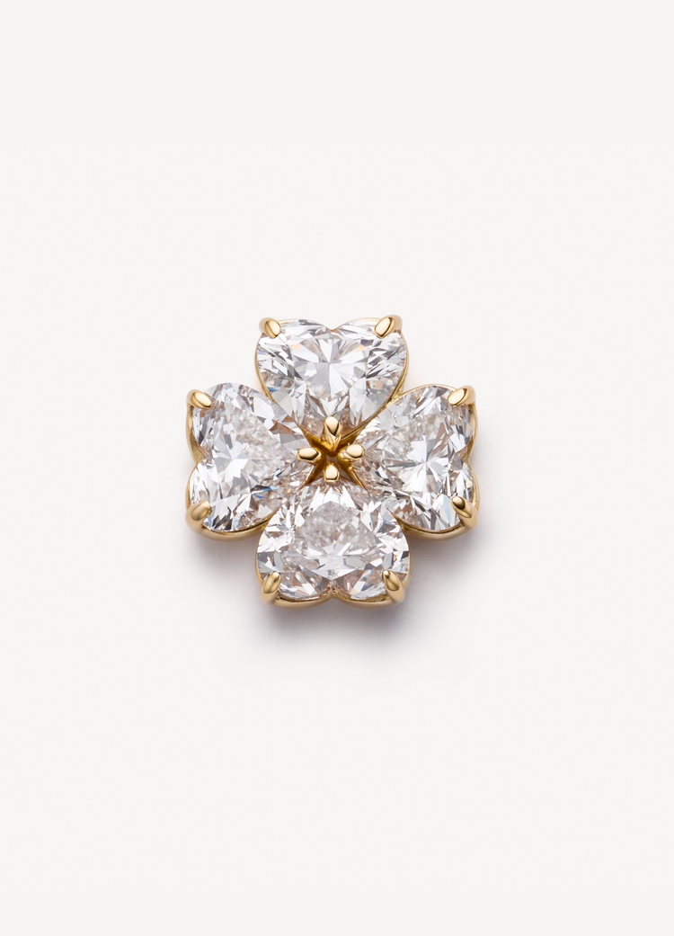 Clover heart charm yellow gold and diamond on white background