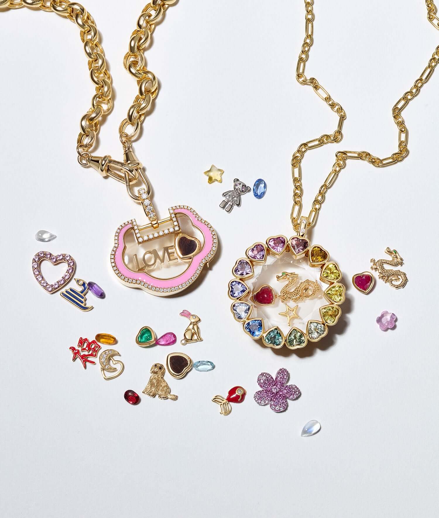 Gold lockets with colorful gemstone charms and pendants, including a Chinese Dragon Charm, displayed on a white background.