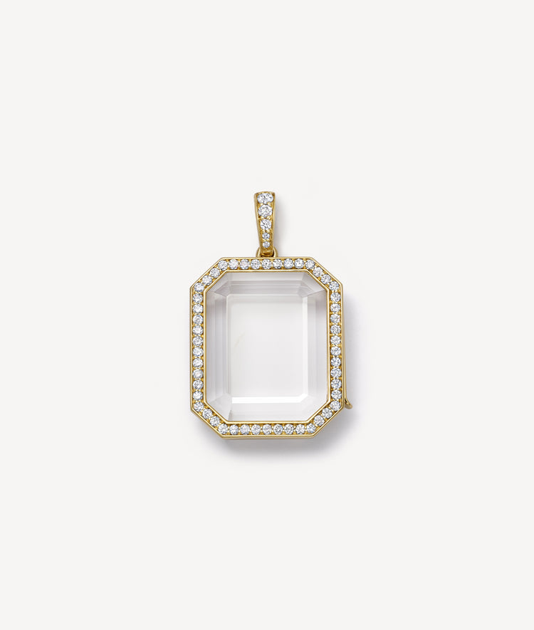 yellow gold diamond baguette locket pendant on a white background