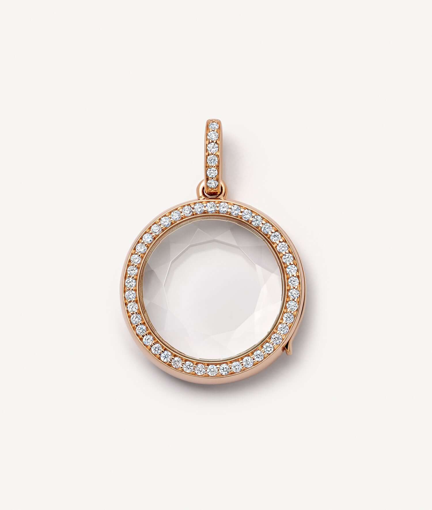 helios round diamond, rose gold locket.