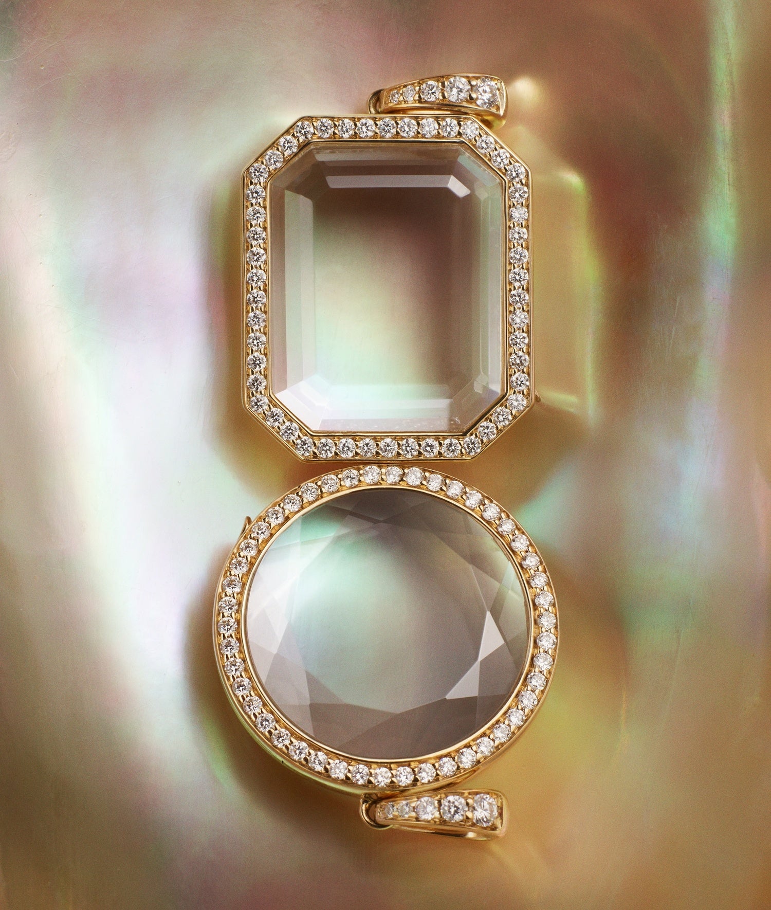 Heritage diamond lockets round and rectangle with crystal facade on a nacre shell background