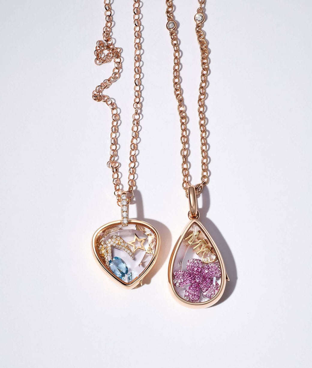 Lacrima teardrop rose gold locket with pear cut rose gold locket, styled with charms including the Blooming blossom charm.