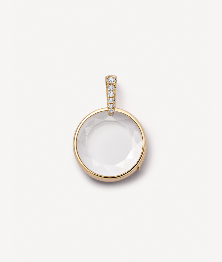 Lyra round diamond gold locket styled empty, with diamond bail.