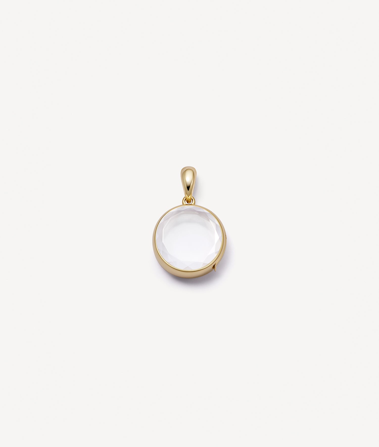 Mini round locket pendant with faceted crystal facade on white background