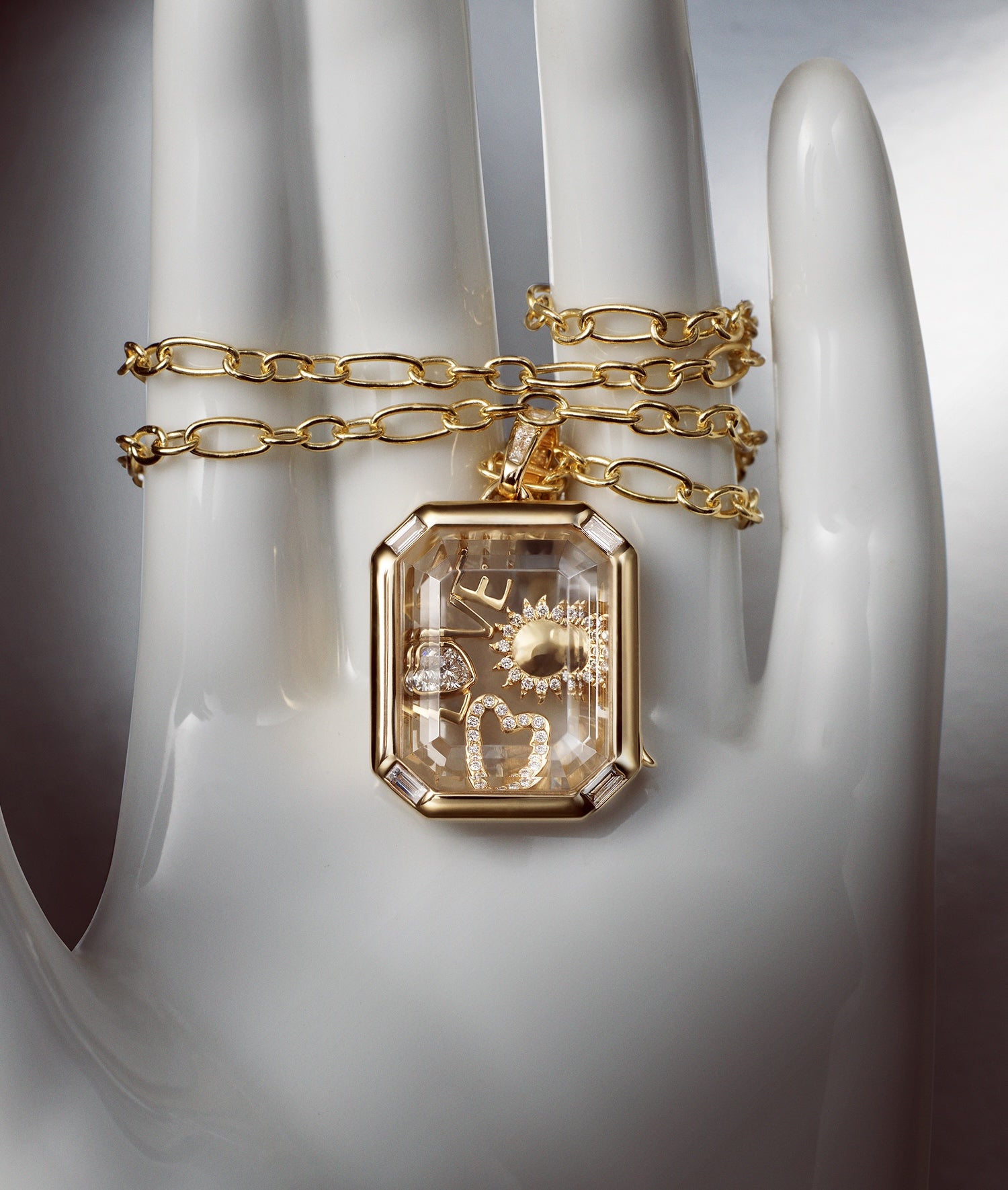 Quattro Baguette Locket 18K