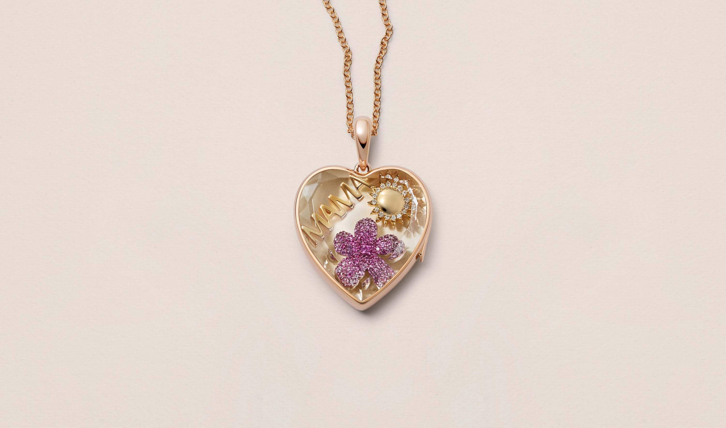 Rose Gold Hear of Gold Locket 14k locket with Mama charm, Blooming Blossom charm and Diamond Sun charm.
