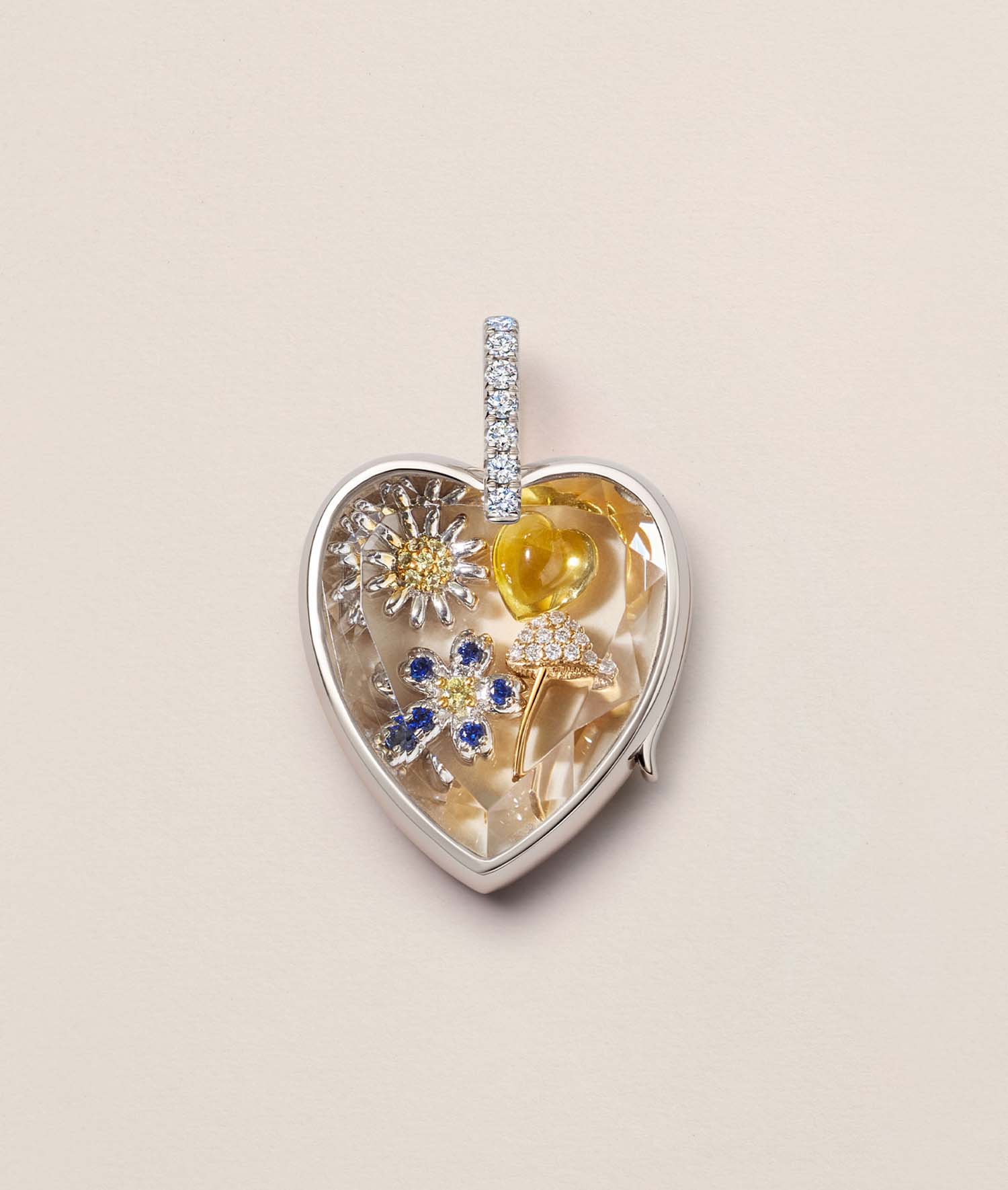Heart-shaped locket necklace pendant with gemstones charms, including yellow and blue flowers