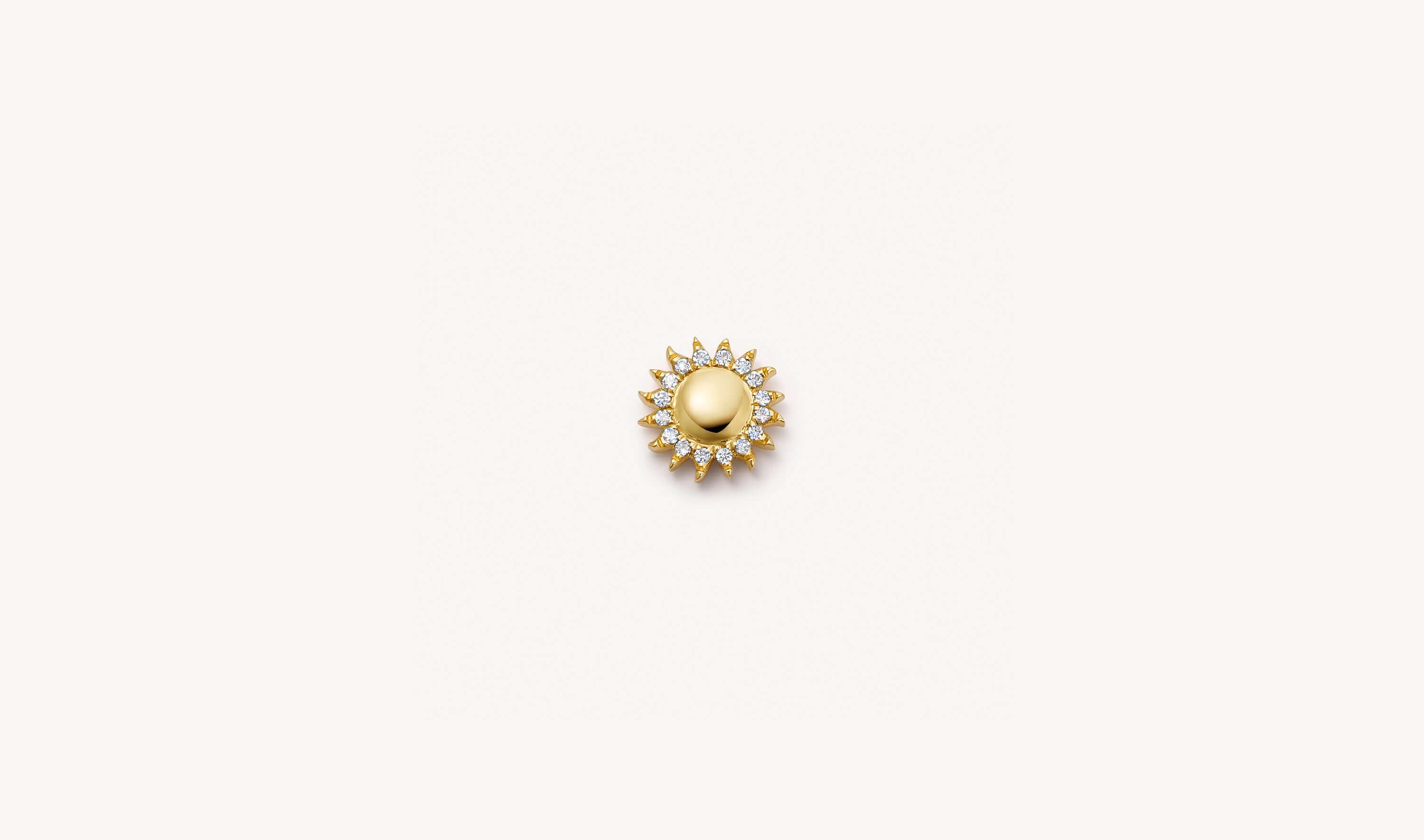 diamond set sun yellow gold charm