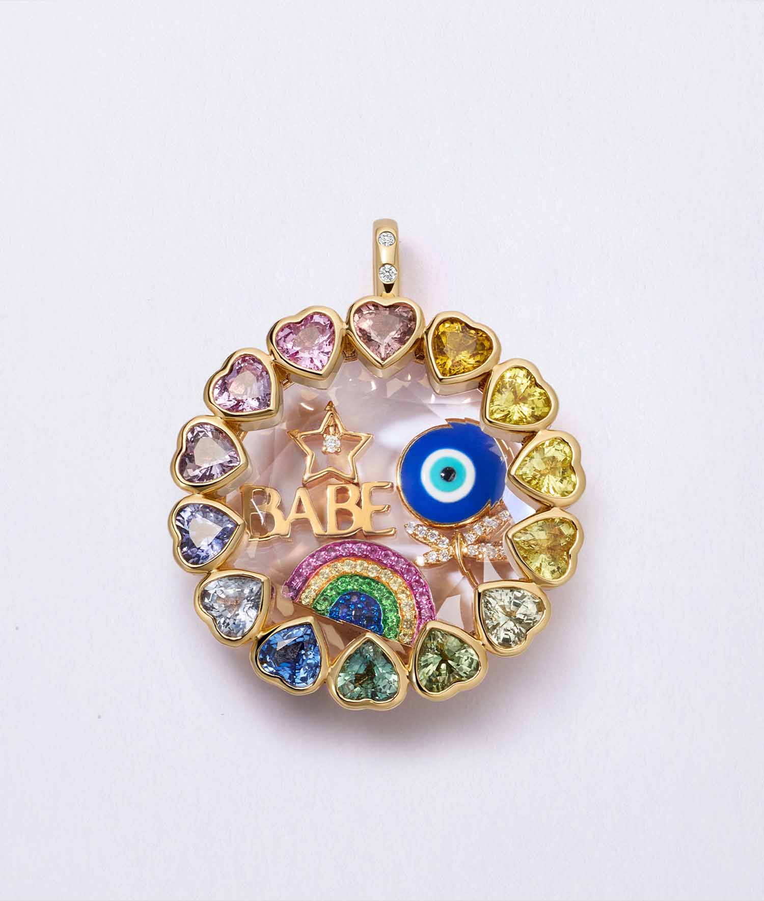 Colorful heart-shaped gemstone locket pendant with star, Turkish eye, rainbow, and "Babe" charms on a white background.