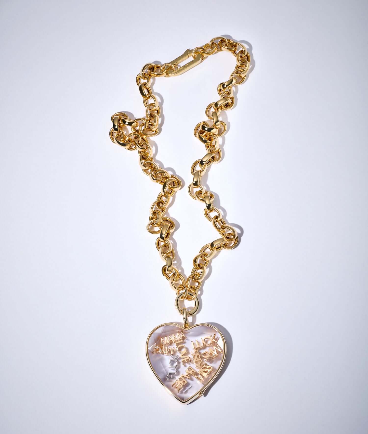 18k yellow gold word charms styled in a XL heart locket pendant and a chunky yellow gold chain