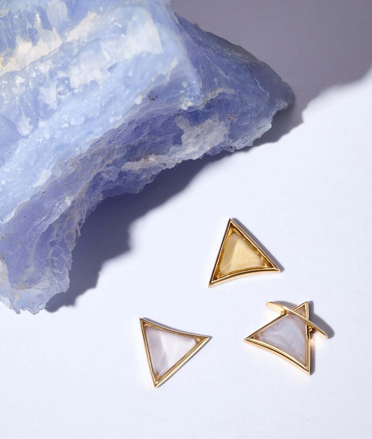 Blue Agate Air charm, Citrane fire charm and Rose quartz water charm styled against a heeling crystal.