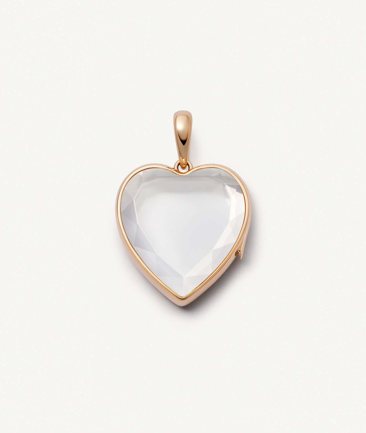 Heart-shaped white sapphire locket in pale rose 14k gold, showcasing a brilliant crystal design.