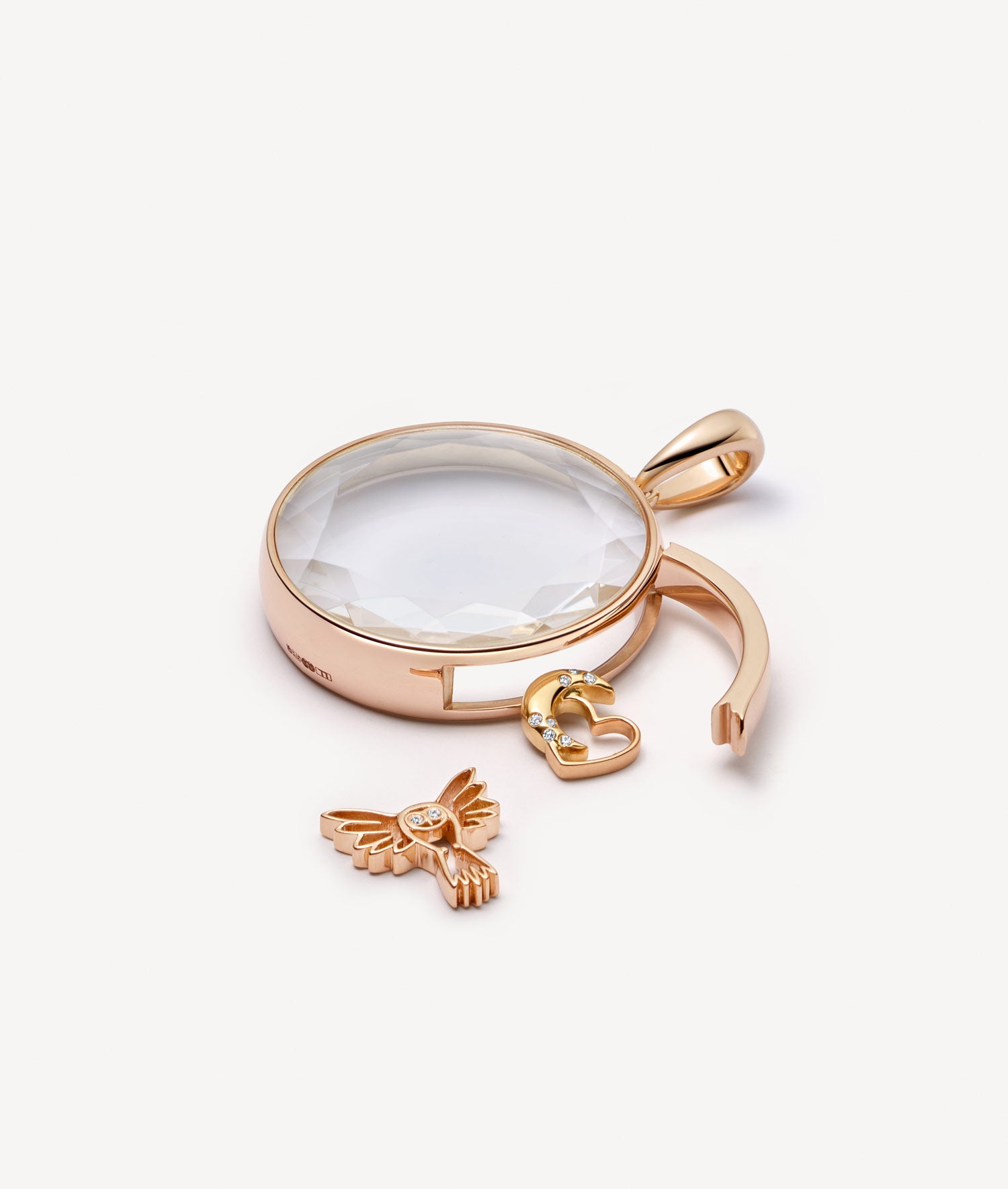 Large Round Rose Gold Locket 14k with charms, latch open.