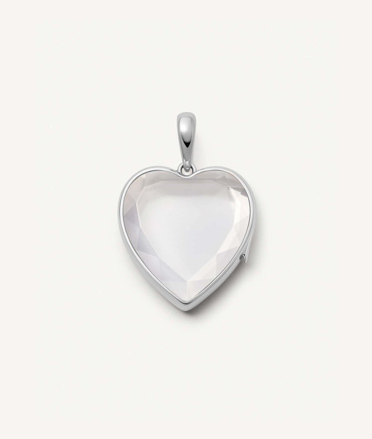 14k white gold heart-shaped locket pendant with sapphire crystal facade ready to be personalised with charms.