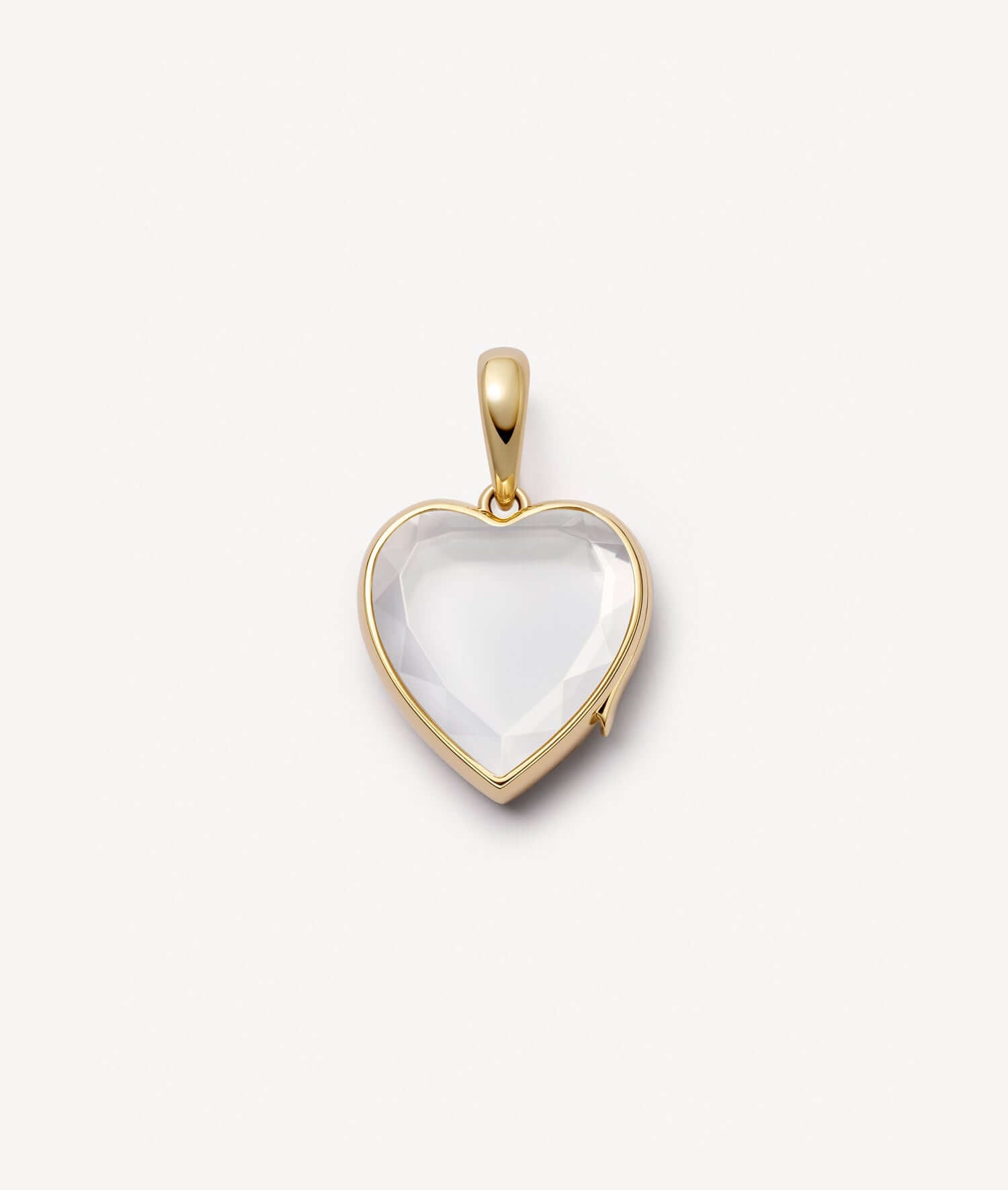 Yellow gold with crystal faceted facade locket